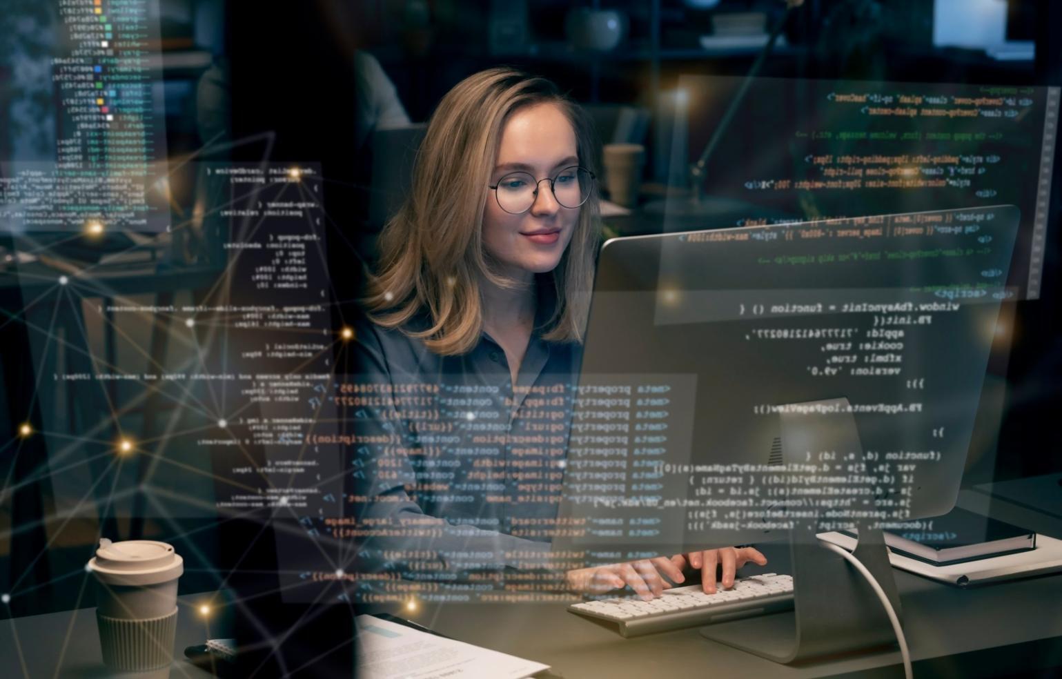 Active game development session with team reviewing analytics